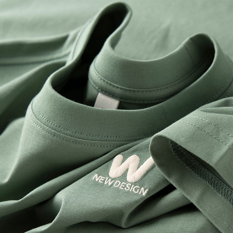 Minimalist Embroidered T-Shirt with "New Design" Logo